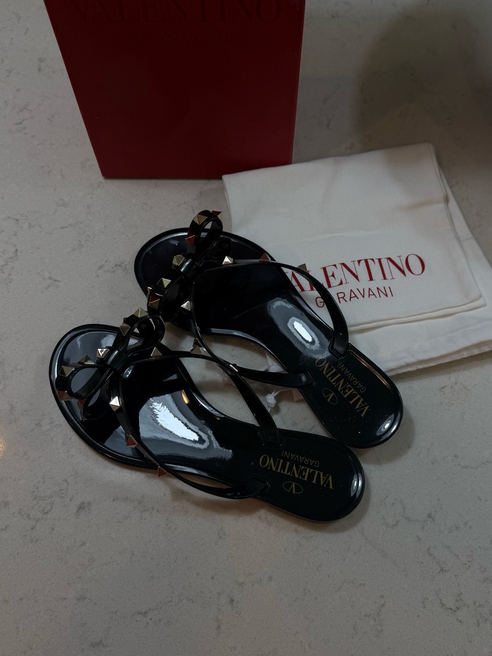 Valentino Garavani Black Patent Studded Bow Thong Sandals